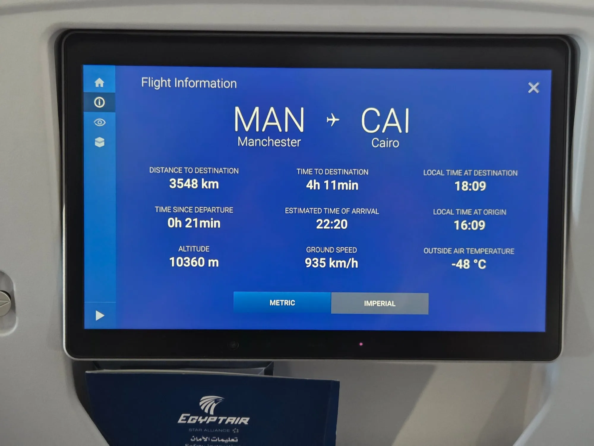 Seat-back screen showing the flight from Manchester to Cairo, with 4 hours 11 minutes to go